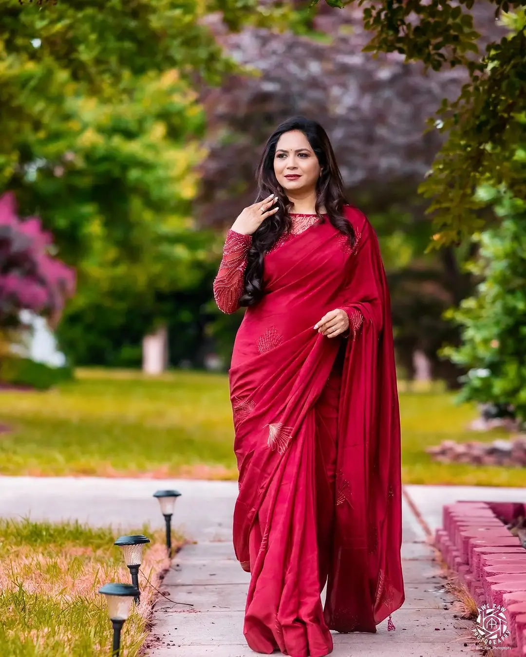 Telugu Singer Sunitha Stills In Maroon Saree Blouse